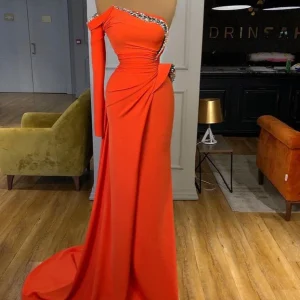 Elegant Orange Long Sleeves Mermaid Prom Dress with Shimmering Sequin Embellishments